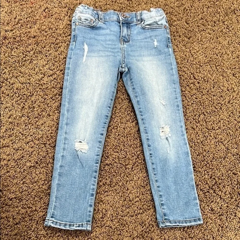Celebrity Pink Blue Jeans with Distressed Details